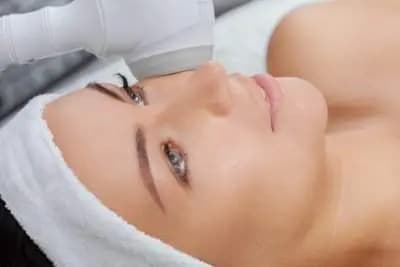 model prepping for a facial